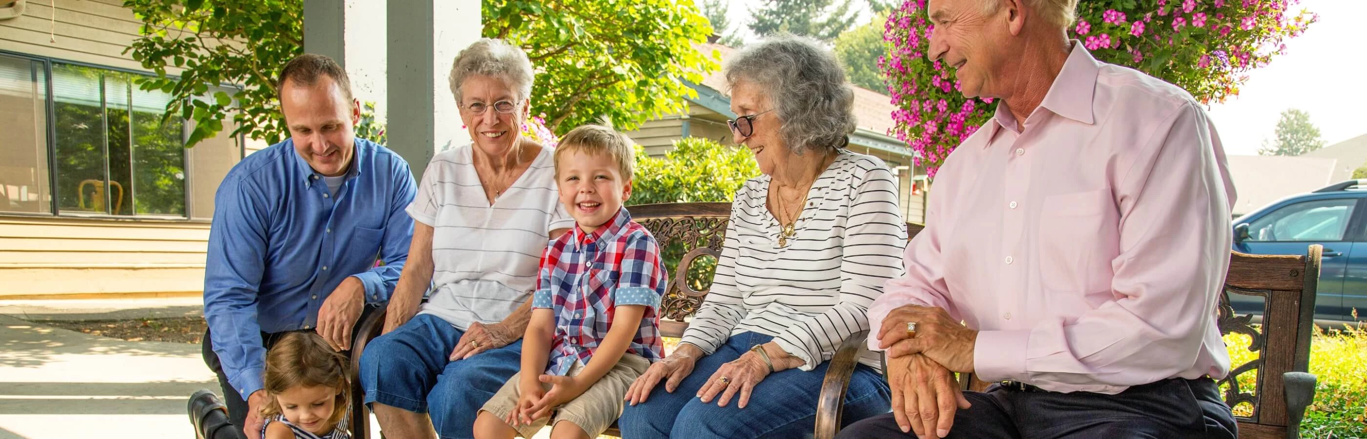 family-sitting-on-porch